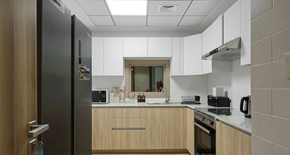 Luxury Apartment, Balcony, Canal View | Private kitchen | Fridge, oven, stovetop, dishwasher