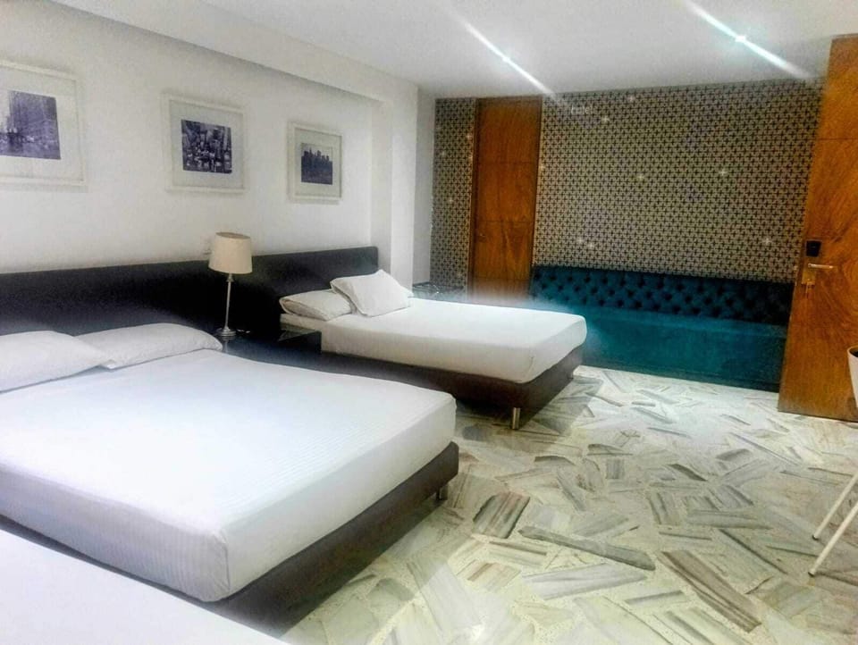 Standard Quadruple Room | Desk, laptop workspace, iron/ironing board (on request), WiFi (free)