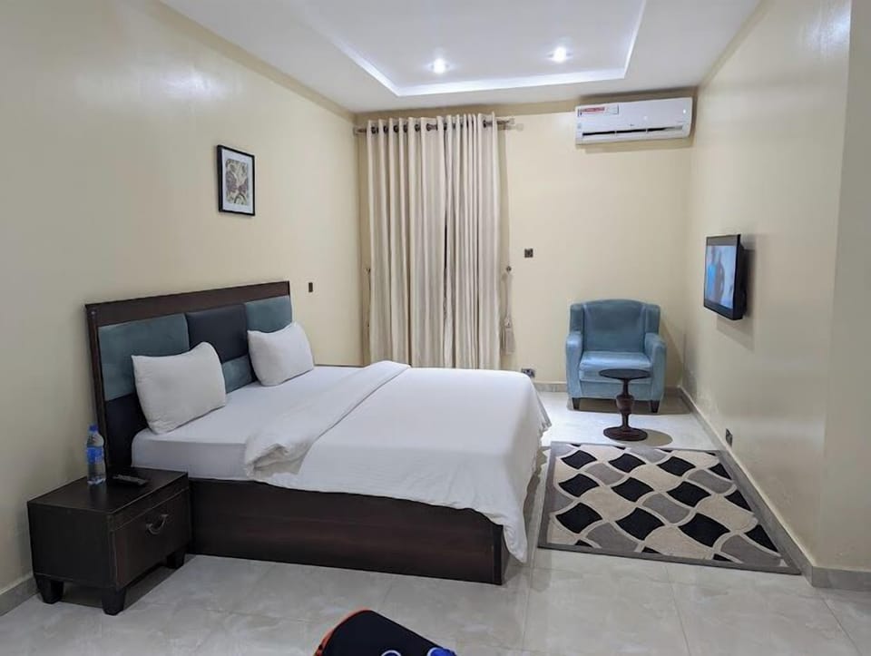 Deluxe Room, Balcony, City View | Desk, laptop workspace, iron/ironing board, free WiFi