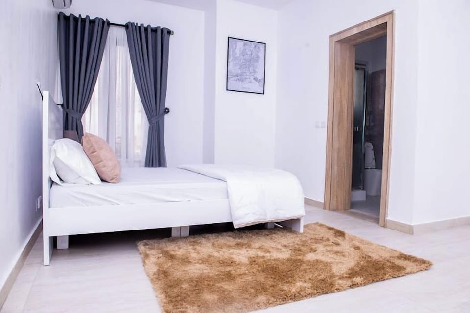 Deluxe Room, Balcony, City View | Desk, laptop workspace, iron/ironing board, free WiFi