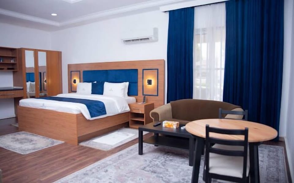 Deluxe Room, Balcony, City View | Desk, laptop workspace, free WiFi