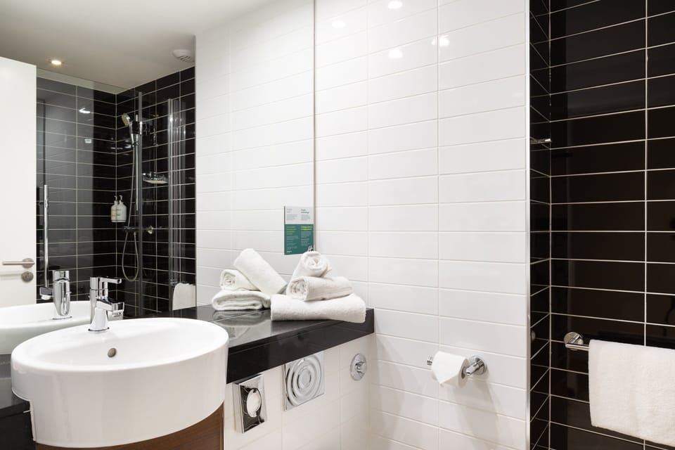 Shower, eco-friendly toiletries, hair dryer, towels