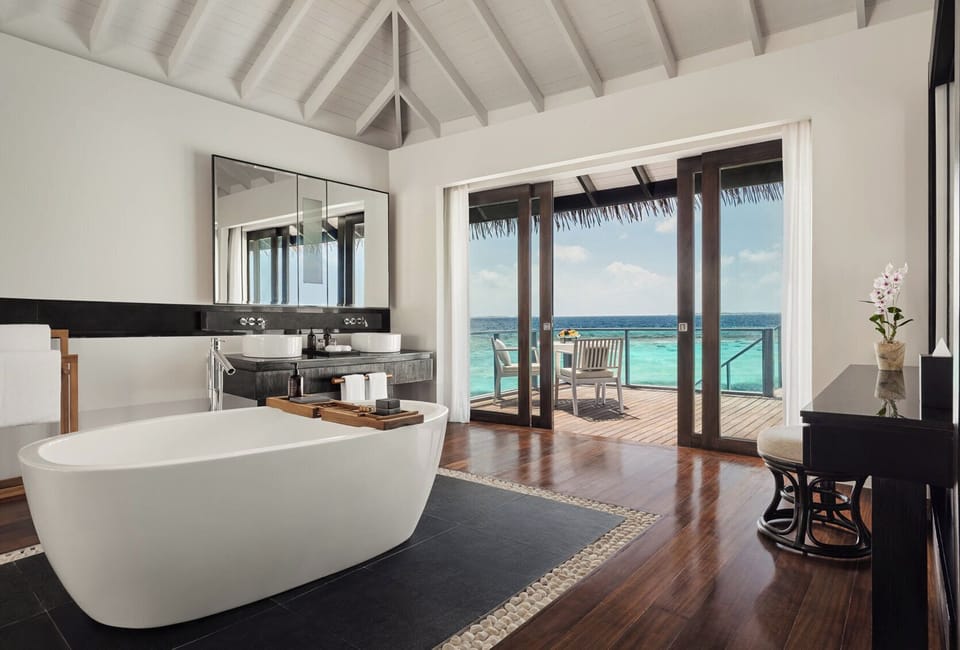 Separate tub and shower, rainfall showerhead, hair dryer, bathrobes