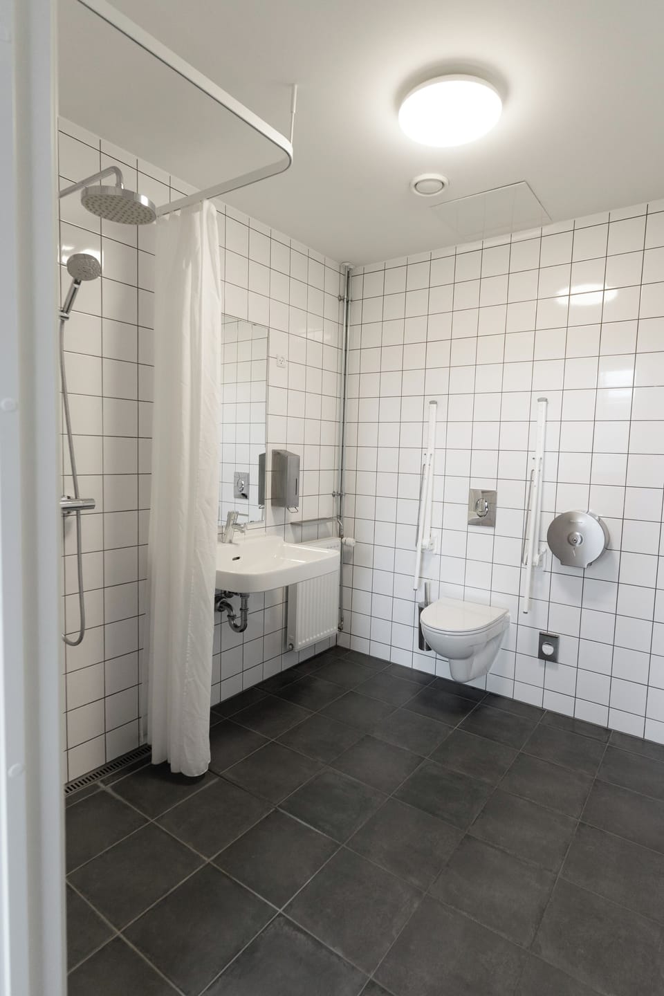 Studio Suite | Bathroom | Shower, toilet paper