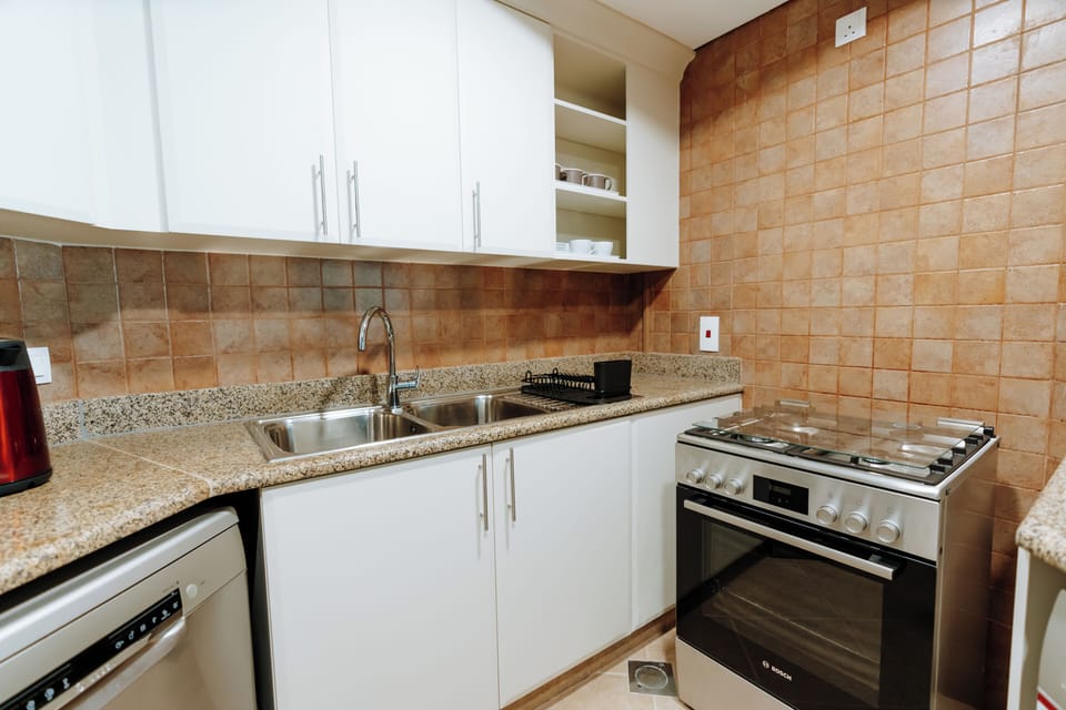 Deluxe Apartment, Balcony, Ocean View | Private kitchen | Electric kettle