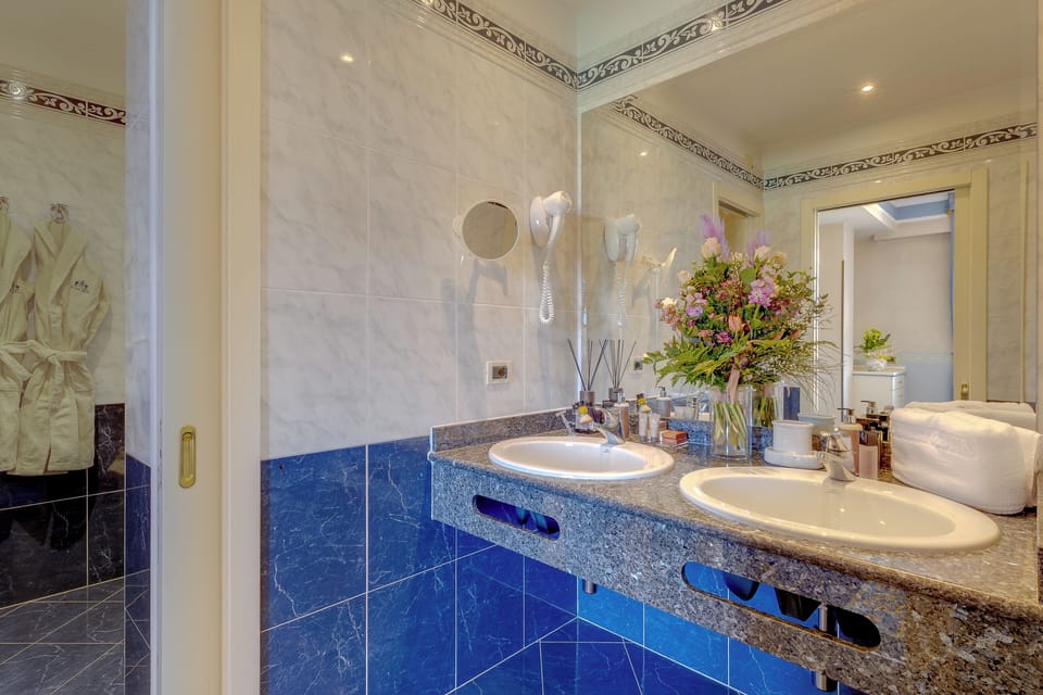 Deep soaking tub, rainfall showerhead, hair dryer, bathrobes