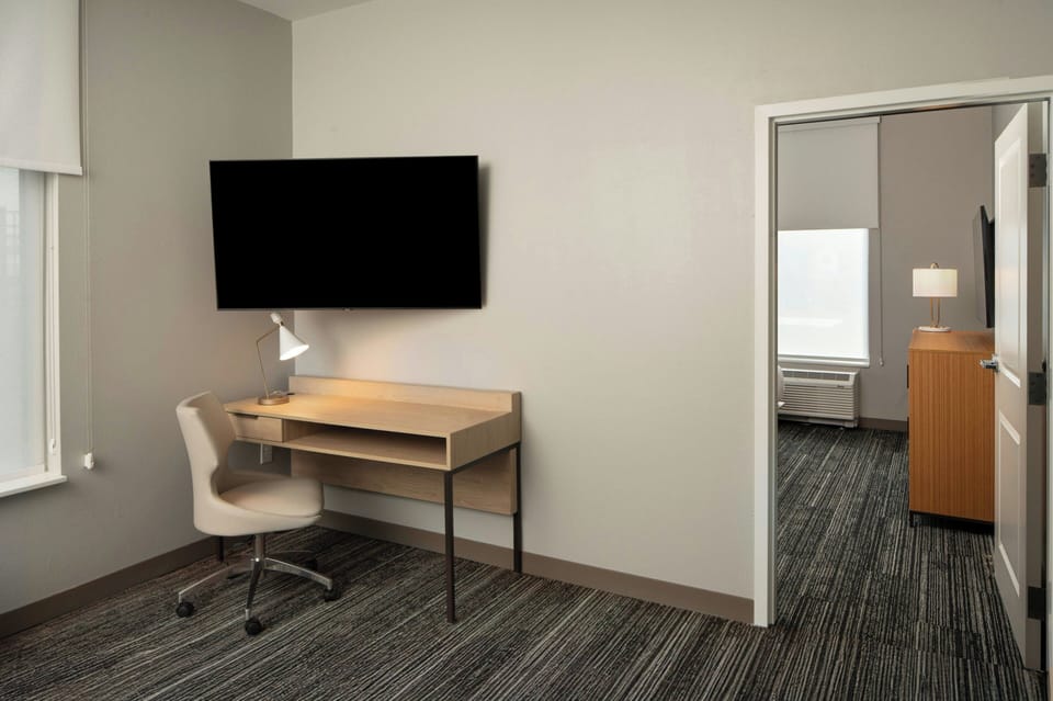 Suite, 1 Bedroom | Hypo-allergenic bedding, desk, laptop workspace, blackout drapes
