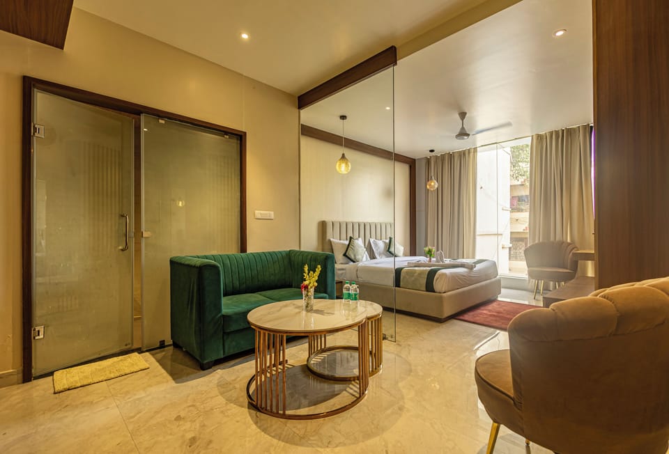 Family Suite, City View | Living area | TV