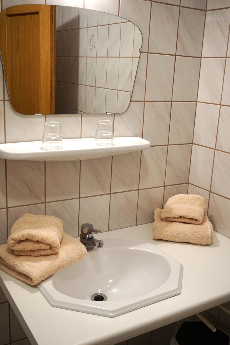Classic Apartment | Bathroom | Hair dryer, towels, toilet paper