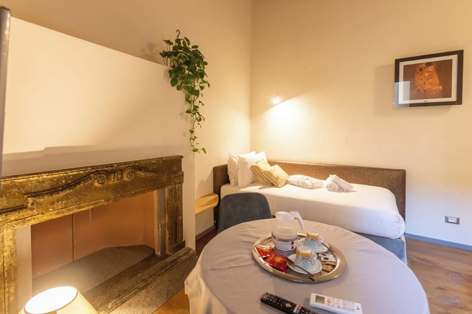 Deluxe Studio Suite | In-room safe, blackout drapes, soundproofing, iron/ironing board