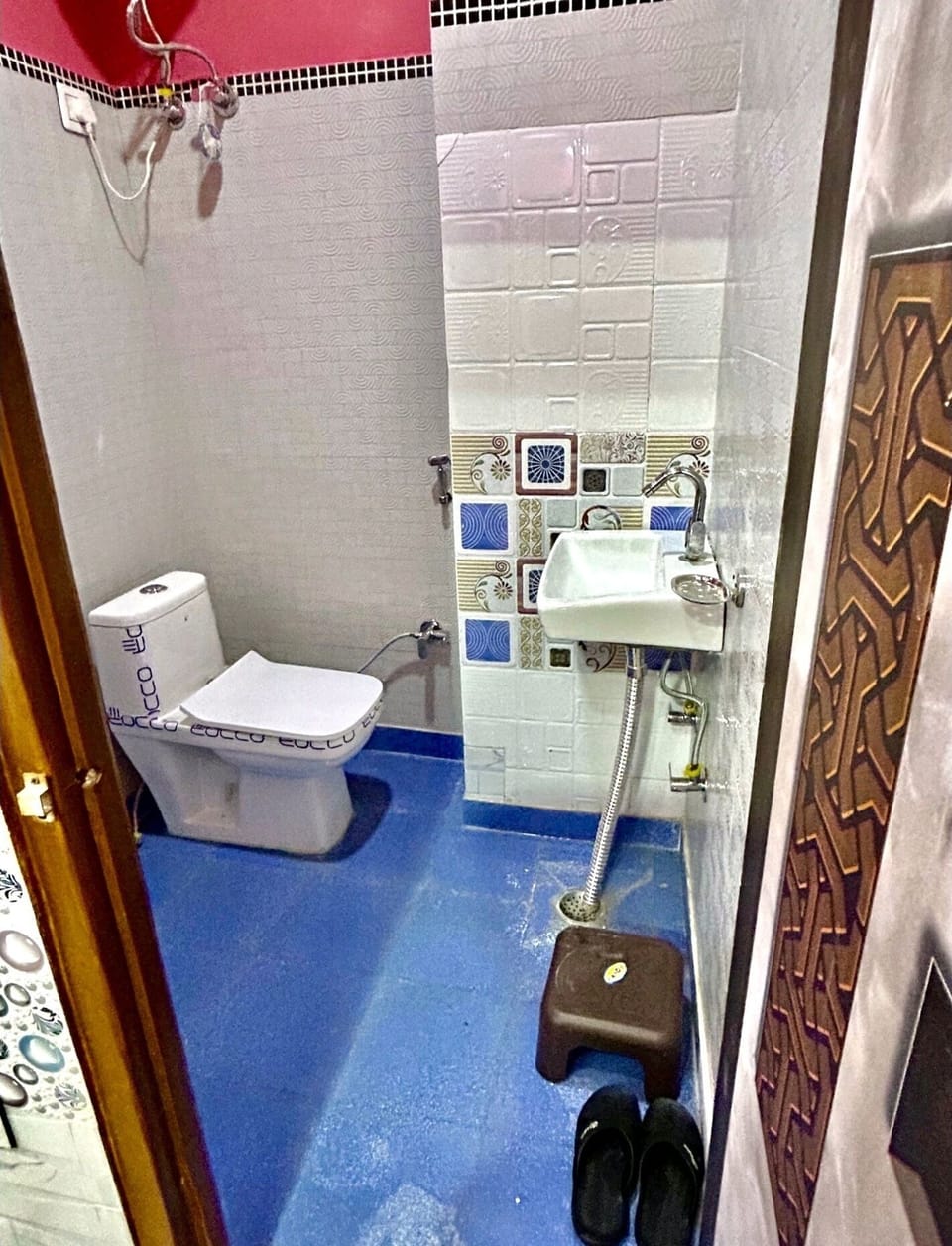 Shower, free toiletries, slippers, towels