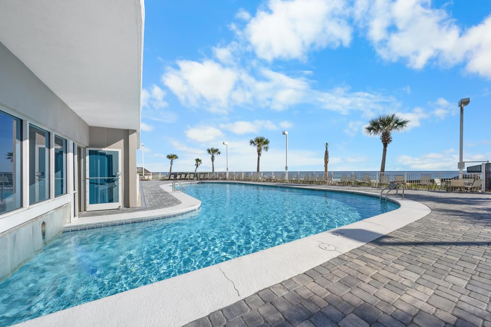 Condo, 1 King Bed with Sofa bed (Tradewinds 1103) | Pool | A heated pool