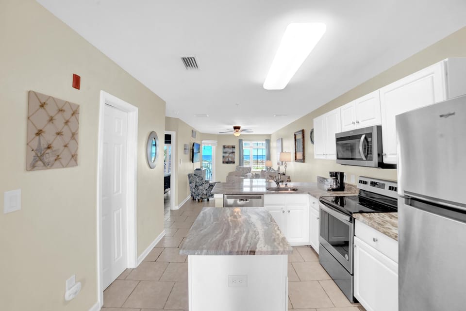 Condo, Multiple Beds (Grand Caribbean 209) | Private kitchen | Oven, dishwasher, toaster