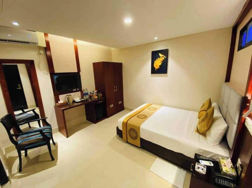 Deluxe Room, City View | In-room safe, desk, free WiFi