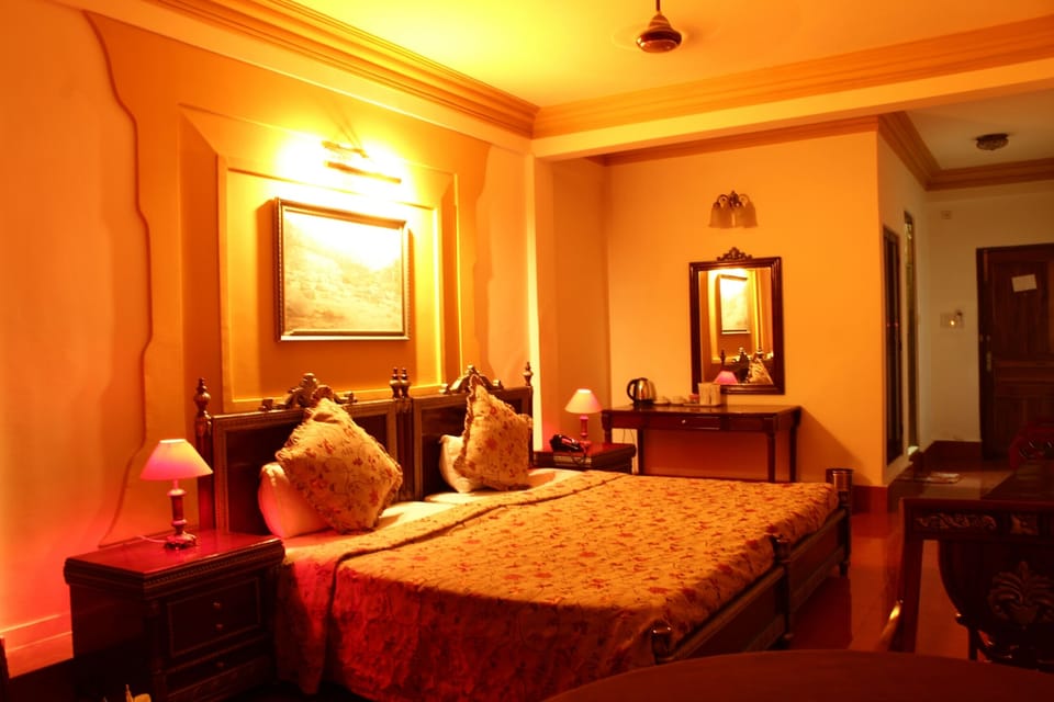 Deluxe Suite, 1 King Bed, Bathtub, Valley View | 7 bedrooms, premium bedding, memory foam beds, desk
