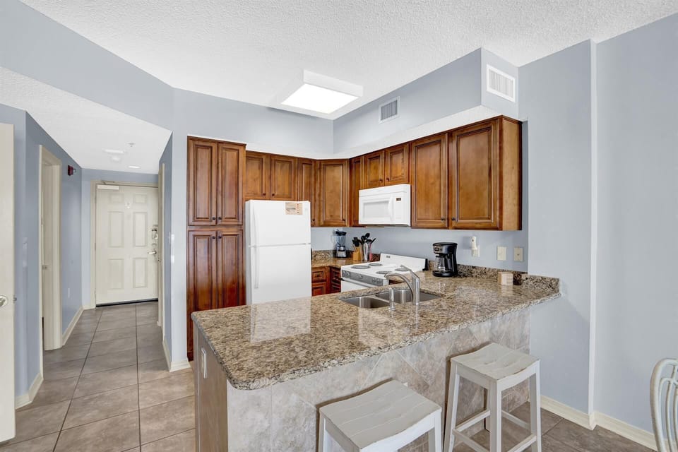 Condo, Multiple Beds (Tidewater 702) | Private kitchen | Oven, toaster