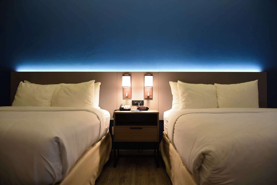 Standard Room, 2 Queen Beds, Non Smoking | Desk, laptop workspace, blackout drapes, iron/ironing board