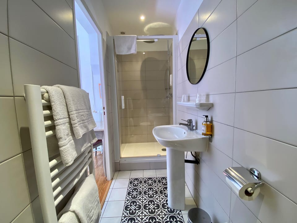 Double Standard Room, road side | Bathroom | Hair dryer, towels