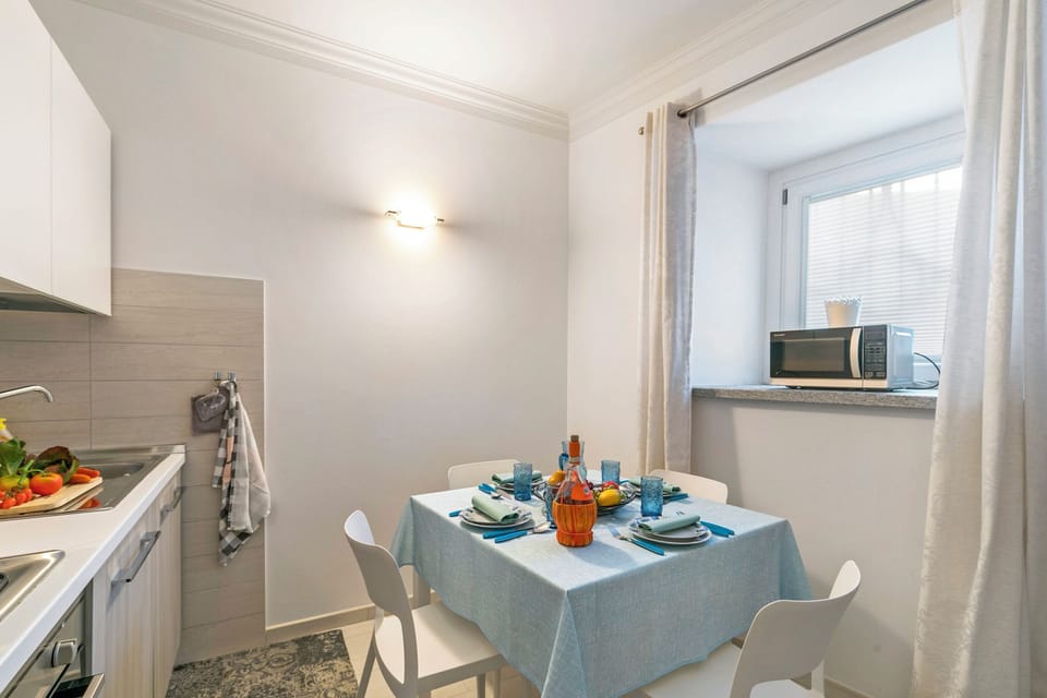 Family Apartment, 1 Bedroom, Microwave, Mountainside (Little Mermaid of Stresa Pet Friendly) | Dining