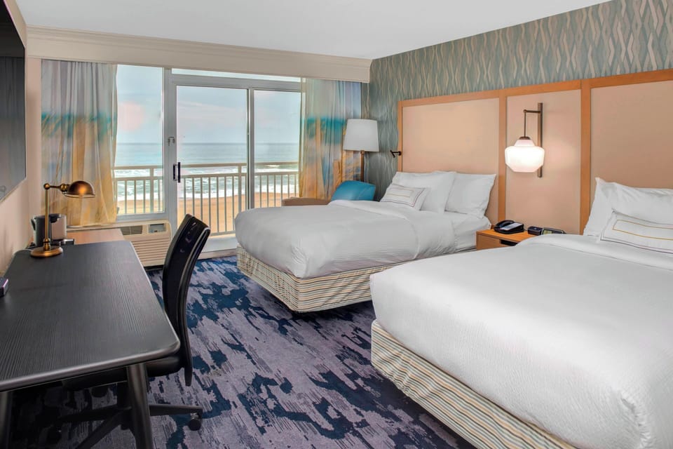 Premium bedding, down comforters, desk, laptop workspace