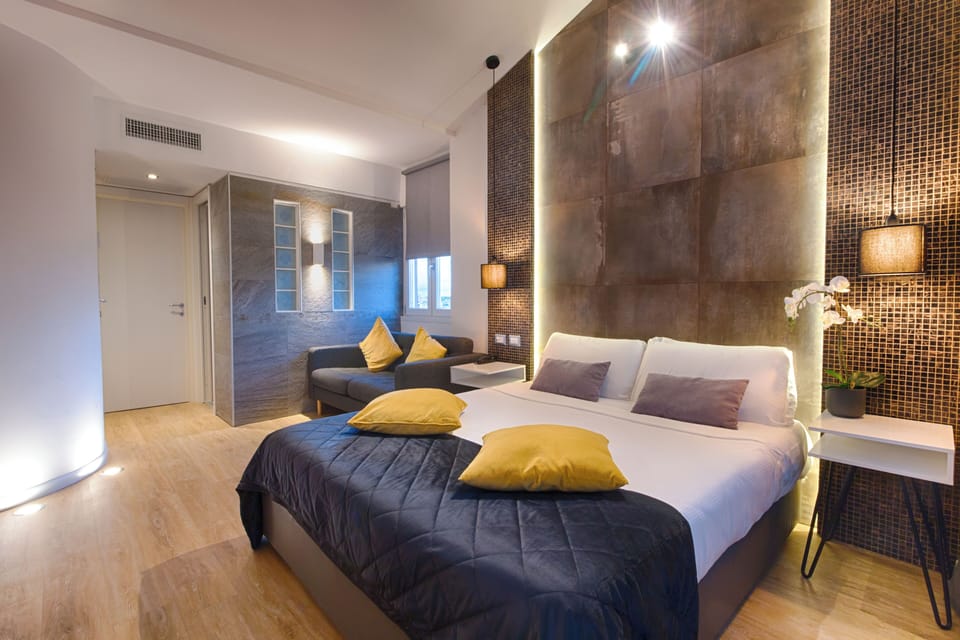 Superior Suite with Balcony | In-room safe, desk, laptop workspace, blackout drapes