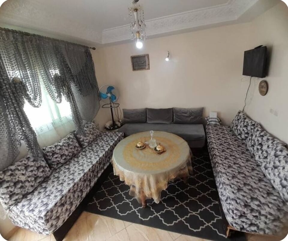 Apartment, City View | Living area | Flat-screen TV