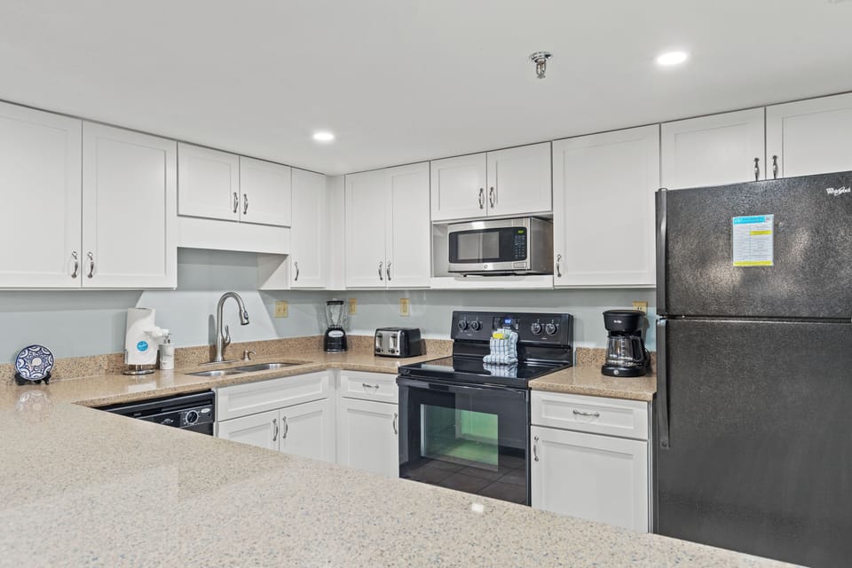 Condo, Multiple Beds, Balcony, Ocean View (Watercrest 905) | Private kitchen | Fridge, microwave, oven, stovetop