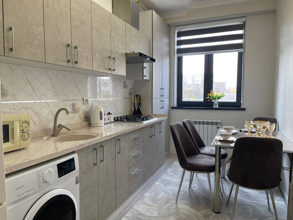 Family Condo, City View | Private kitchen | Full-size fridge, microwave, stovetop, electric kettle