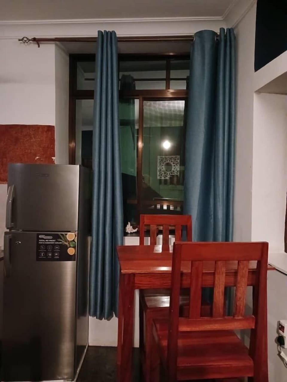 Deluxe House, City View | Living area | Flat-screen TV