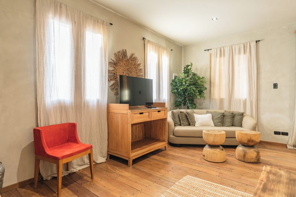 Imperial Suite | Living area | 42-inch Smart TV with digital channels, Netflix, streaming services