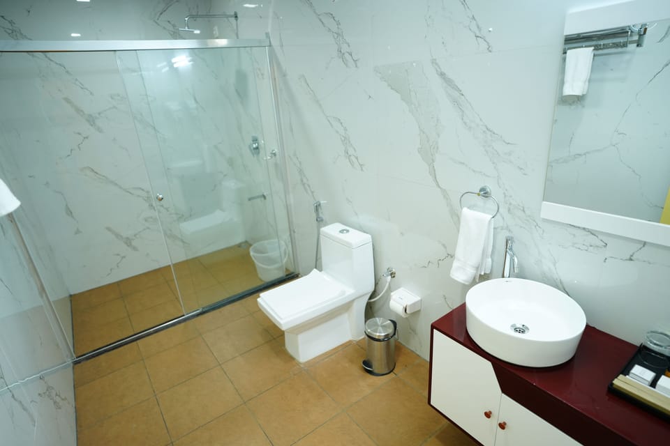 Bluebell | Bathroom | Shower, hair dryer, slippers, towels