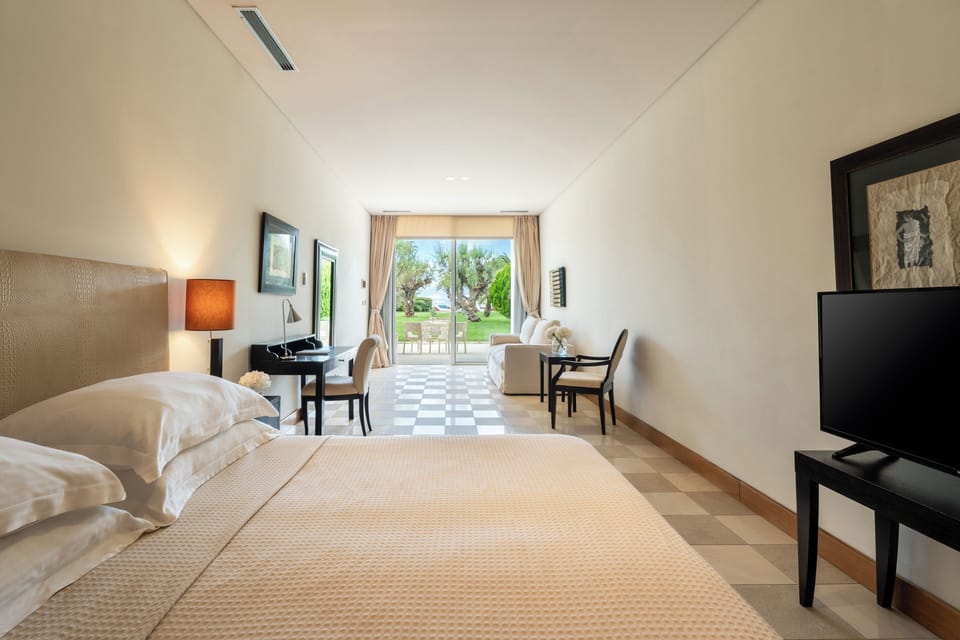 Exclusive Quadruple Room, Ground Floor | Premium bedding, minibar, in-room safe, desk