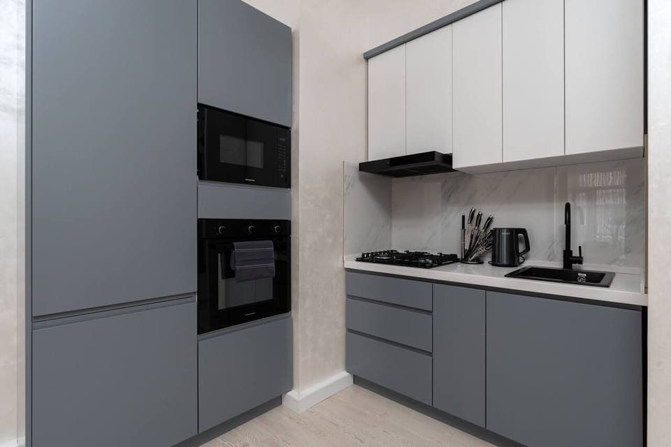 Family Condo, Balcony, City View | Private kitchen | Electric kettle