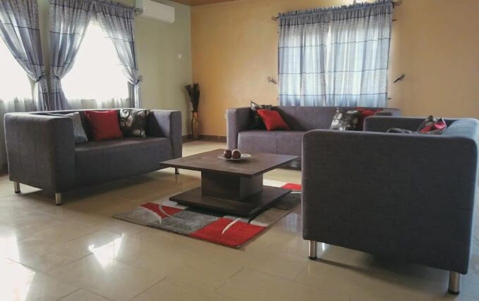 Economy Apartment, Balcony, City View | Living area | Flat-screen TV
