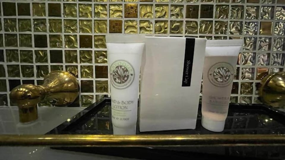 Deluxe Room, Balcony, City View | Bathroom | Free toiletries, hair dryer, towels, soap