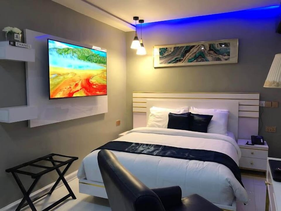 Deluxe Room, Balcony, City View | Desk, laptop workspace, free WiFi