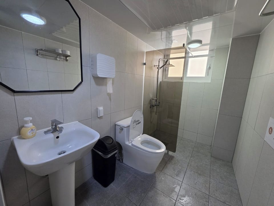 Shared Dormitory, Women only (2 Persons) - Foreigner Only / Contact hotel for self check-in process | Bathroom | Shower, hair dryer, slippers, towels