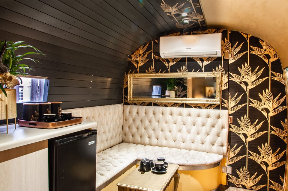 Airstream Trailer | Living area | 45-inch flat-screen TV with cable channels, TV, Netflix