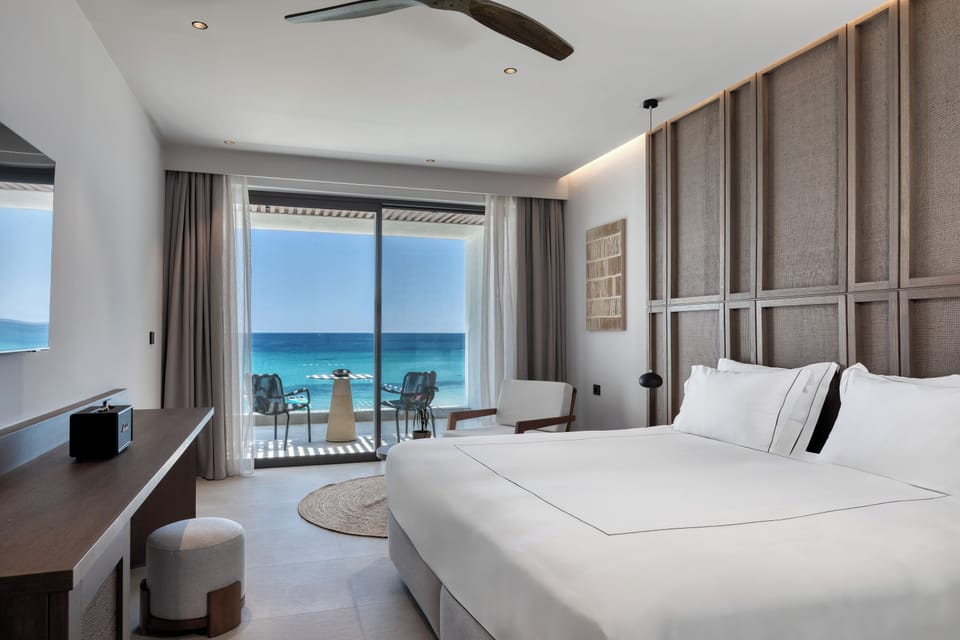 Superior Sea View Suite, Balcony | In-room safe, desk, laptop workspace, blackout drapes