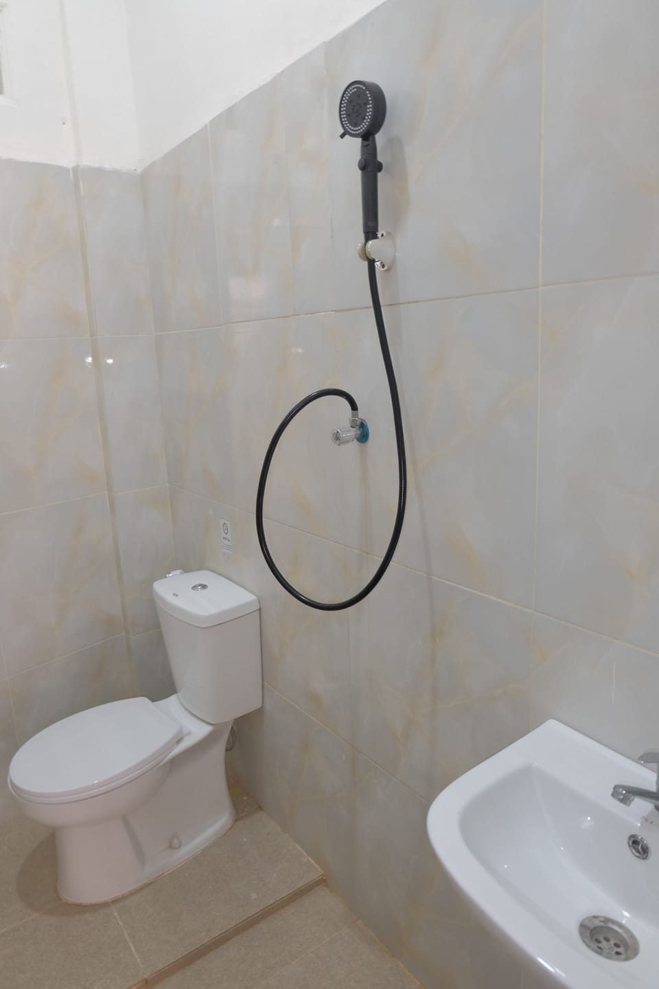 Shower, slippers, bidet, towels