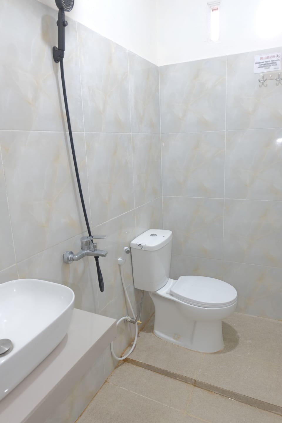 Shower, slippers, bidet, towels