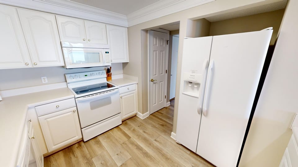 Condo, 2 Bedrooms | Private kitchen | Coffee/tea maker, fridge, oven, toaster