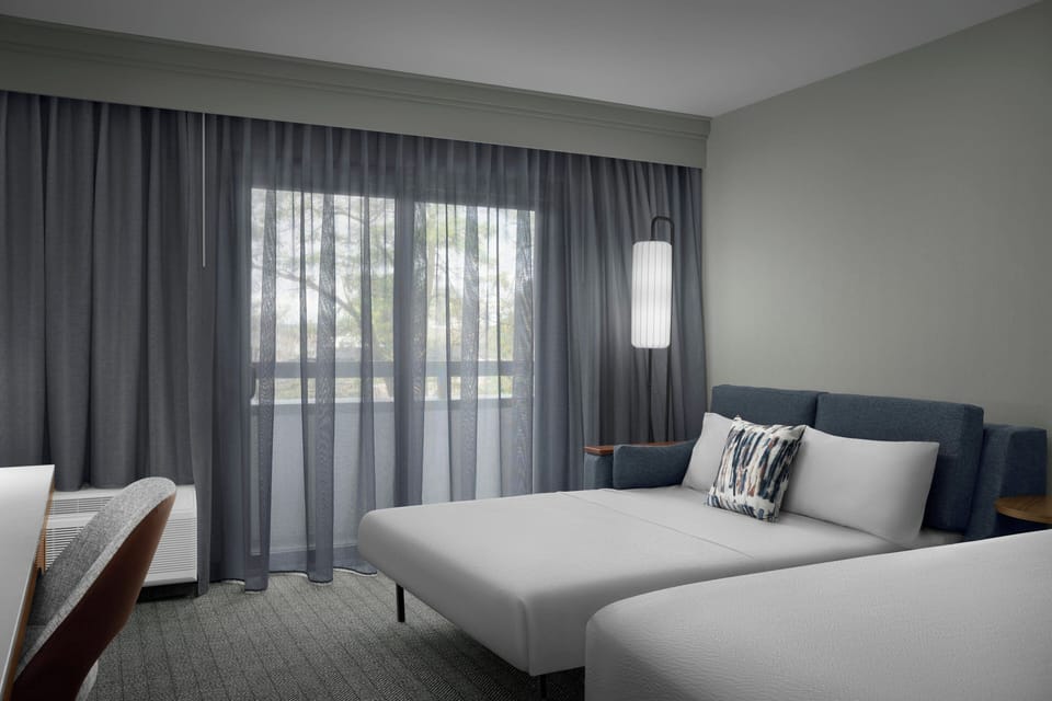 Premium bedding, down comforters, pillowtop beds, in-room safe