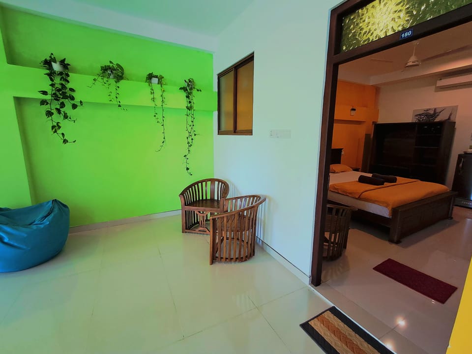 Apartment With Garden View | Minibar, in-room safe, desk, iron/ironing board