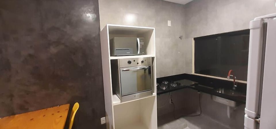 Villa | Private kitchen | Fridge, microwave, oven, stovetop