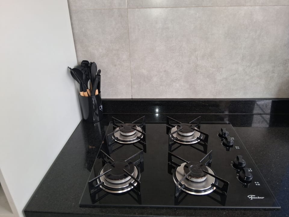 Villa | Private kitchen | Fridge, microwave, oven, stovetop