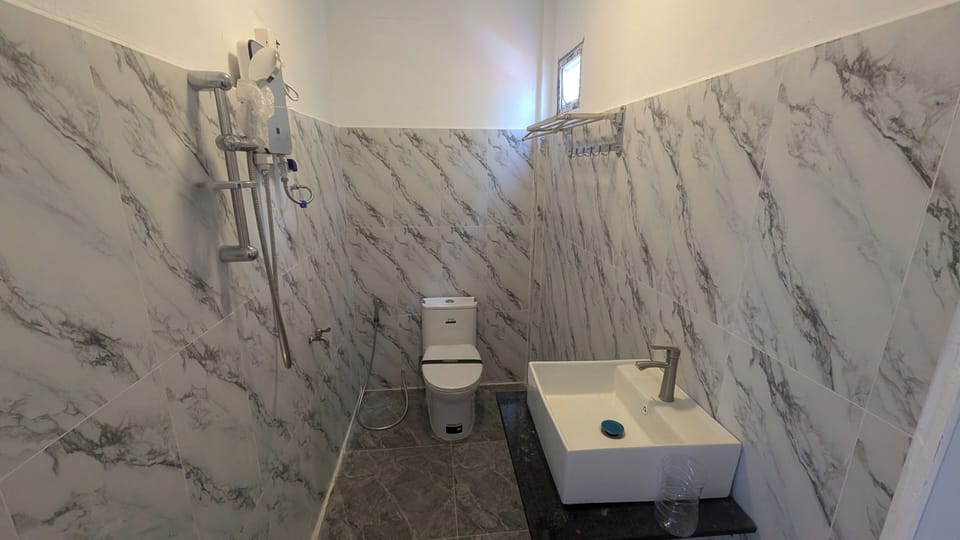 Classic Double Room, Partial Ocean View | Bathroom | Shower, bidet, towels, toilet paper