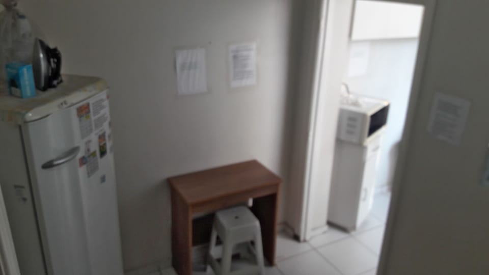 Full-size fridge, stovetop, cookware/dishes/utensils