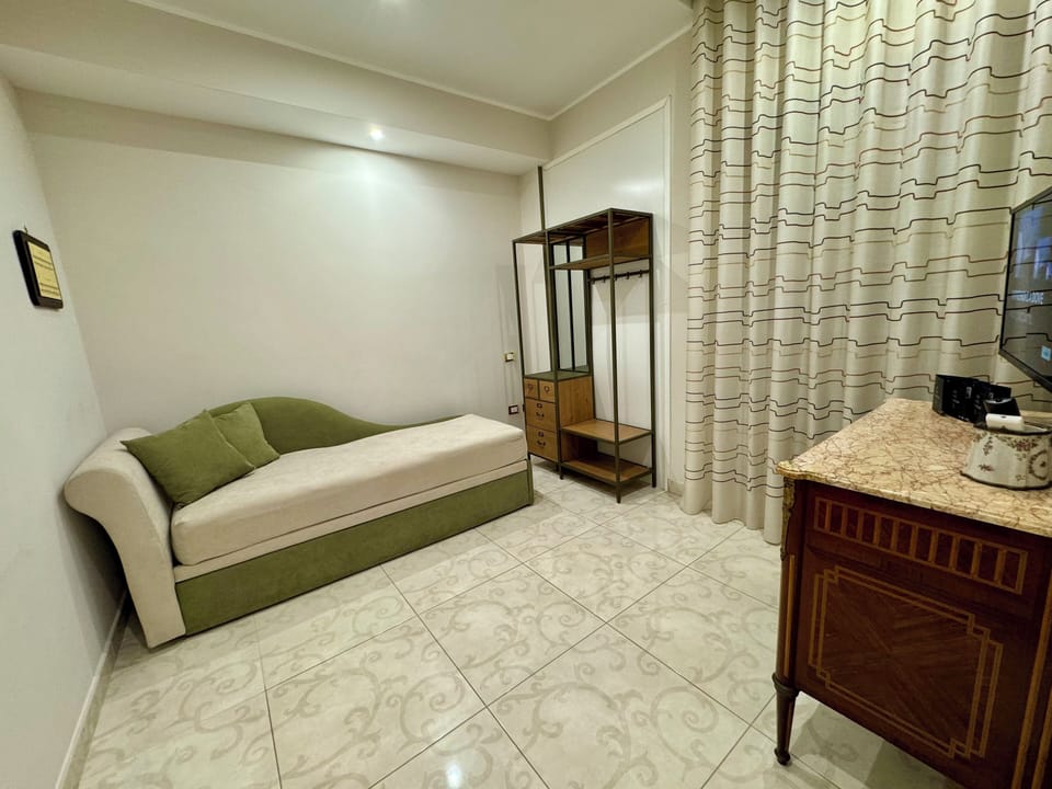 Family Double Room, City View | Down comforters, memory foam beds, minibar, individually decorated