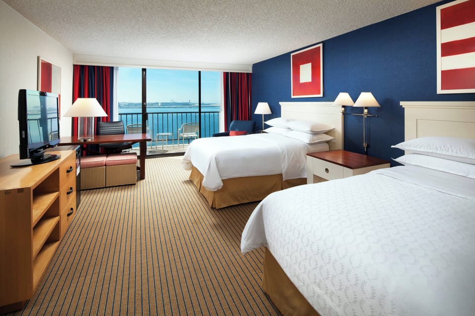 Premium bedding, down comforters, in-room safe, desk
